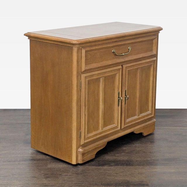 Two door one drawer cabinet with flip-top. Brand: Stanley Furniture. Original Price: $829. Dimensions (in): 38W x 20D x 33H.