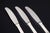 Evald Nielsen, set of three dinner knives. Model number 14. Elegant dinner knives in sterling silver and stainless steel....