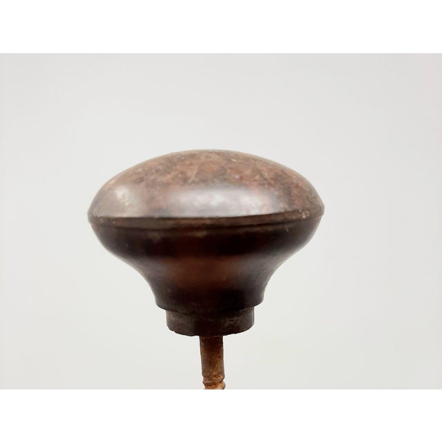 These beautiful brown knobs can be used on a dresser or cabinet door, as a drawer pull. One of these knobs is marked Made...