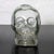 Clear glass sculptural skull vase.