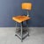 High industrial metal workshop chair from Germany, circa 1950. The metal frame of this chair is gray in color and we have...