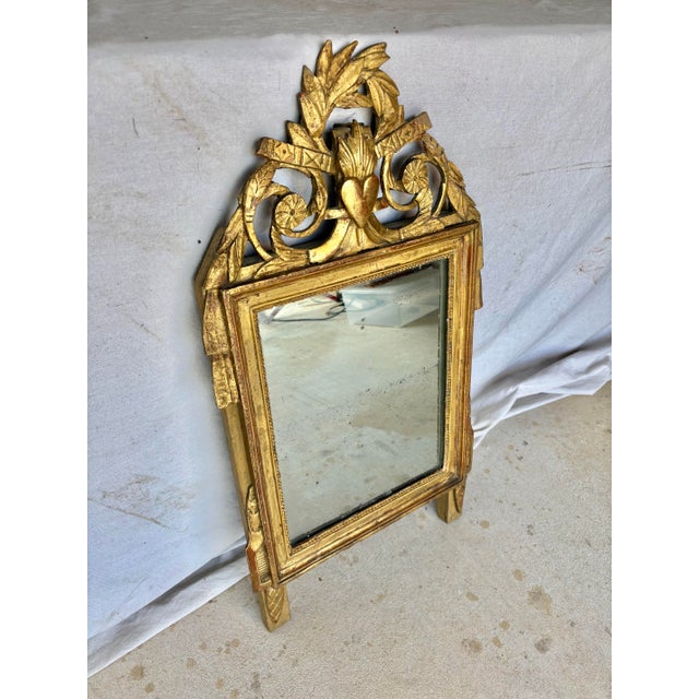 Found in the South of France, this Late 19th Century French Giltwood Wall Mirror was crafted in the late 1800's in the...