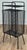 Vintage black perforated metal mesh stand in the style of Richard Galef's Ravenware telephone stand. Iconic metal table...