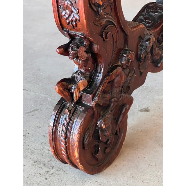 In grand, gothic style, this Spanish library / writing table has a deeply carved edge and this is just the tip of the...