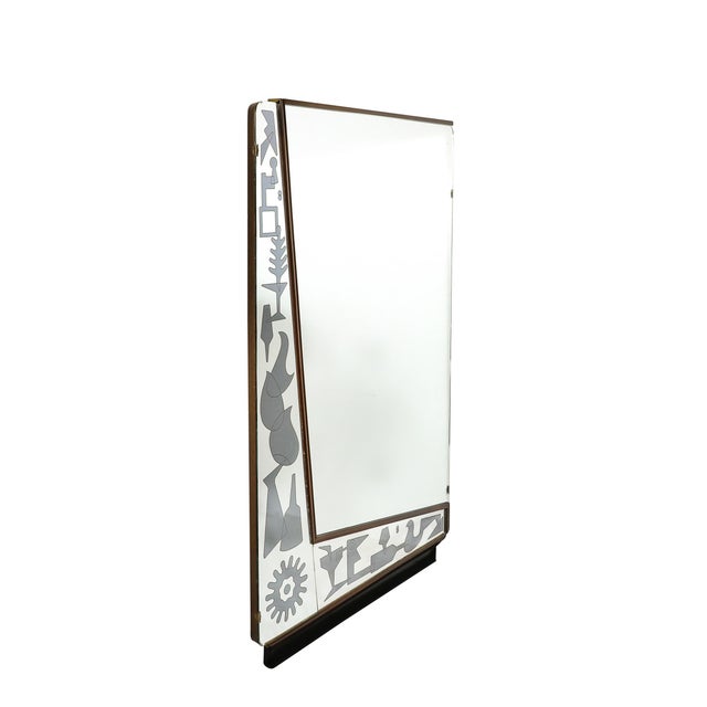 A captivating Mid-Century Modernist mirror, Italian in origin, dating to circa 1950, this piece combines artisanal...