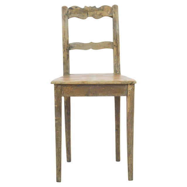 Crafted in the early 1900s, this exquisite German wooden chair epitomizes the timeless elegance and superb craftsmanship...