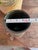 A one-of-a-kind handcrafted studio pottery vessel featuring a richly textured surface, incised geometric patterns, and...
