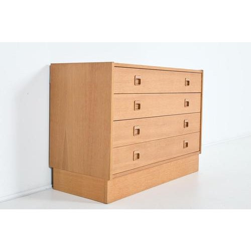 1970s vintage Danish commode in oak veneer from Poul Hundevad, produced in Denmark. Condition Good, age related wear and...