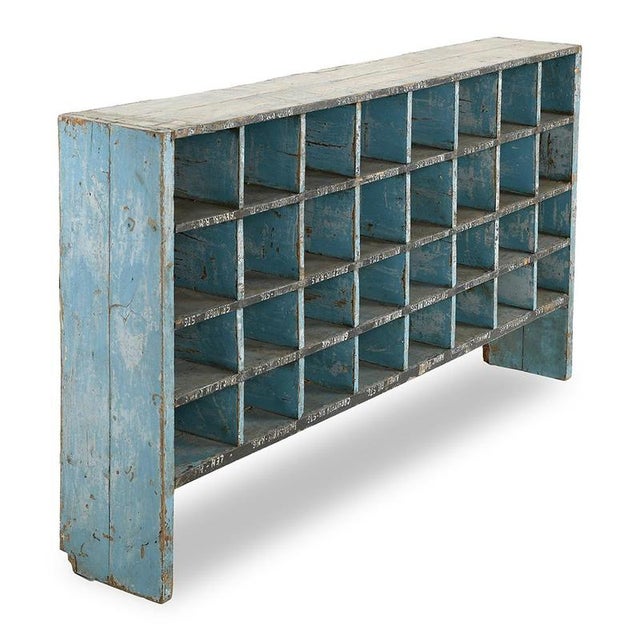 This solid wood workshop cabinet seduces with the strength of its character and the uniqueness of its utilitarian design....