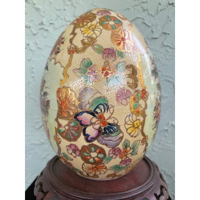 Mid 20th Century Large Chinese Hand-Painted Porcelain Decorative Egg With Carved Wood Stand, 14.5”h For Sale - Image 5 of 9