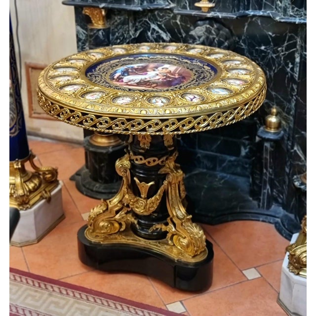 Make a bold statement with this magnificent Rococo-inspired round coffee table, designed to bring dramatic elegance and...