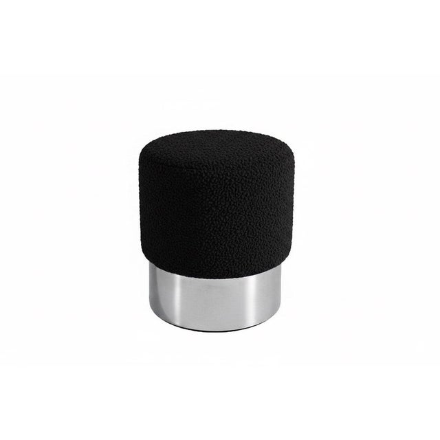 Stool upholstered in Black Sheep-Textured Fabric with Metal Base. Destino speaks of inevitability, of encounters that feel...