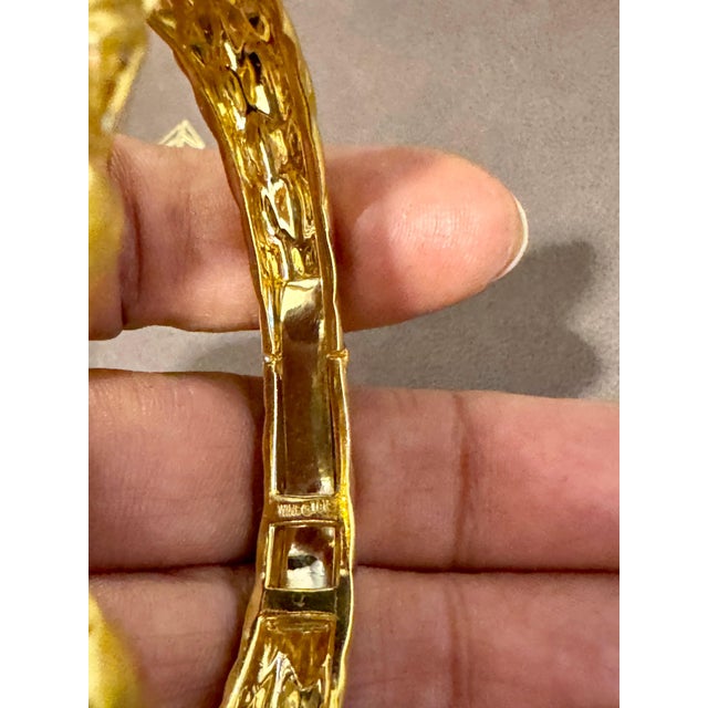 A Bangle by Designer Robert Wander Winc Designer name and 18 K is engraved on the bangle Diamond , Citrine and Amethyst...