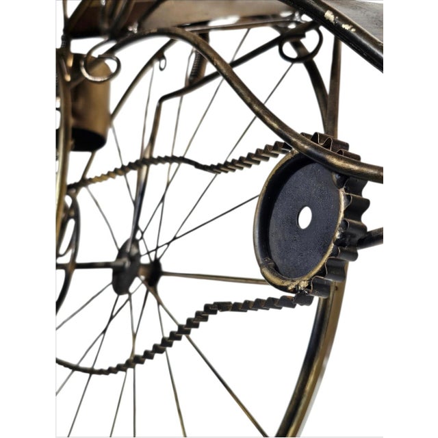 A rare Curtis Jere wall sculpture depicting Karl Benz (Mercedes Benz), the First Motorwagen, built in 1886. Signed along...