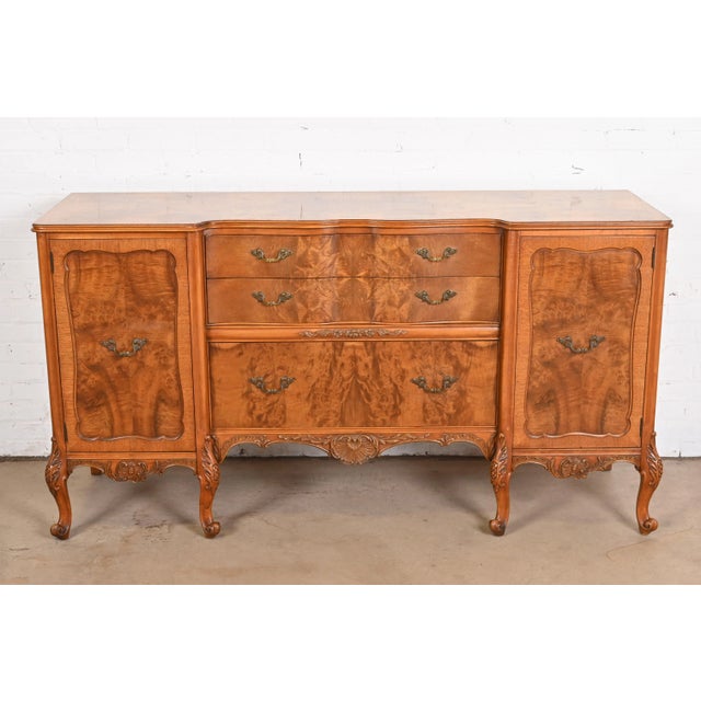 An exceptional French Provincial Louis XV style sideboard, credenza, or bar cabinet By Romweber USA, Circa 1920s Gorgeous...