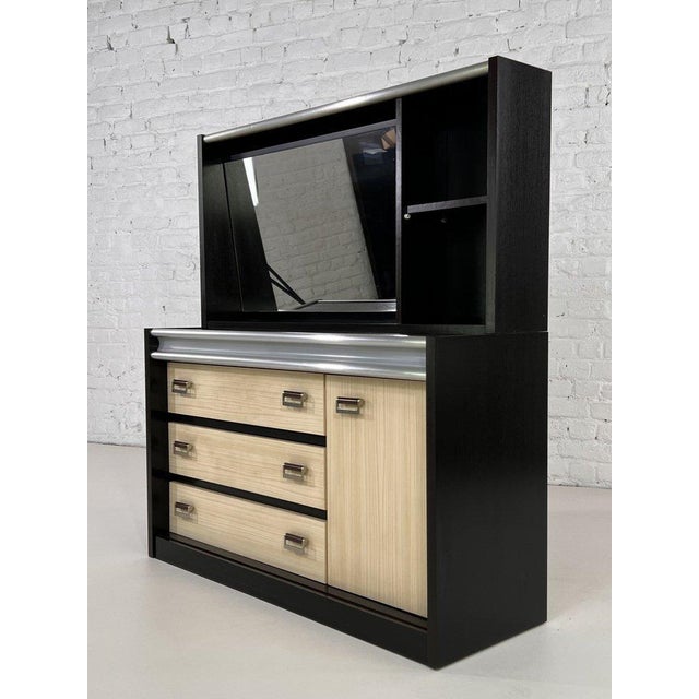 A modular chest of drawers or dressing table from the 1970s-80s, comprising a storage unit (h66/110/38cm) with three...