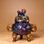 This is a finely crafted vintage bronze incense burner (censer) featuring vibrant, cloisonné-style enamel work. The vessel...