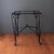 This French Art Deco outdoor black wrought iron table base features scrolling legs with particularly expressive upturned...