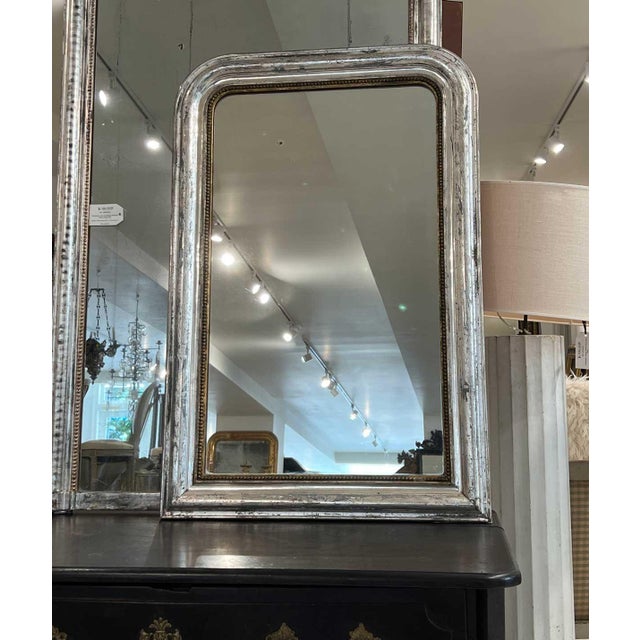 This small Louis Philippe mirror, adorned with a stunning silverleaf finish, is a perfect example of the understated...