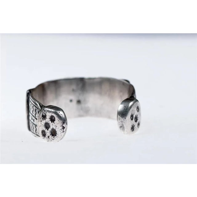 A Tribal Silver Tuareg Hand Tooled Cuff Bracelet from the African Sahara. This very unusual bracelet has a nice heavy...