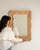 This mirror makes its impression through tan/champagne scalloped frame with star accents. The piece dates to 1940s,...
