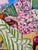 A breezy seaside room filled with pattern, color, and the easy pleasures of summer. Beyond the windows, sailboats drift...