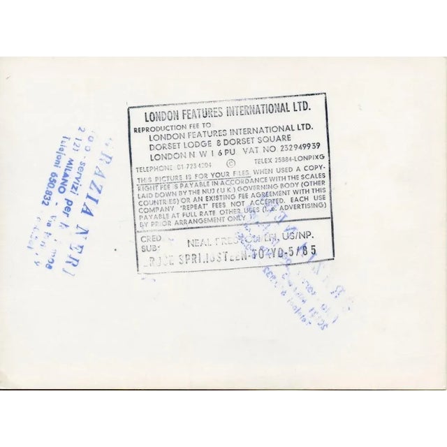 Bruce Springsteen by Neal Preston is a vintage photographic print on double coated paper. Ink stamp of ''London Features...