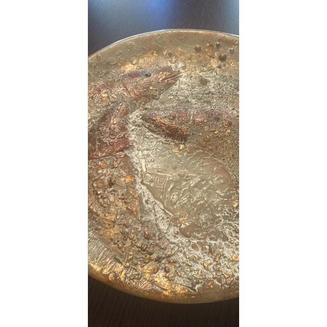 Striking decorative fish platter with a classic chinoiserie\-inspired design\. The piece features an elegant fish motif...