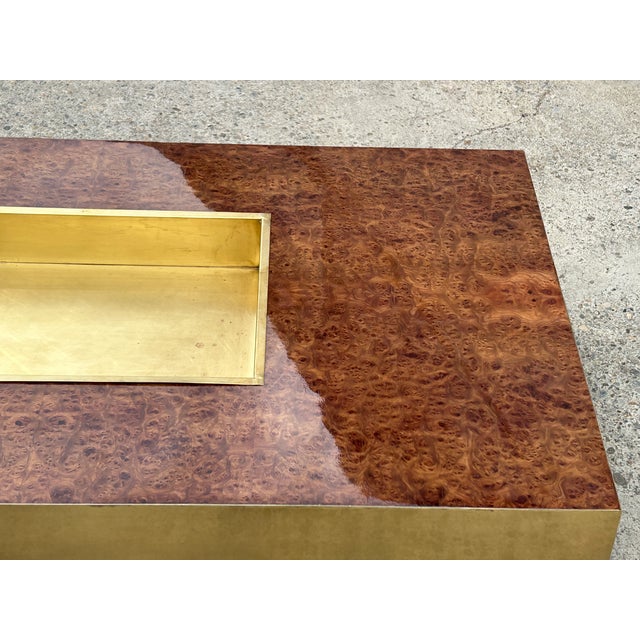 Italian Coffee Table in Walnut Burl and Brass, 1970, in Flawless conditions. Designed 1970 to 1979 This piece is designed...