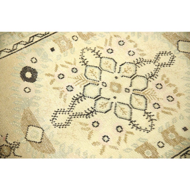 Introducing a one-of-a-kind vintage Turkish hand-knotted wool rug, carefully crafted by skilled artisans using traditional...