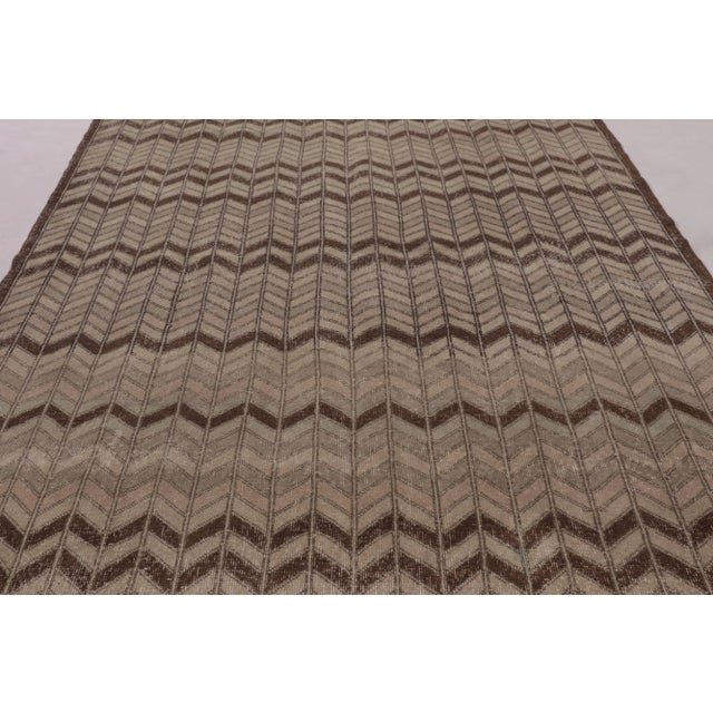 Made with hand-knotted wool and originating circa 1960-1970, this 7x11 vintage rug is an exciting new piece in Rug &...