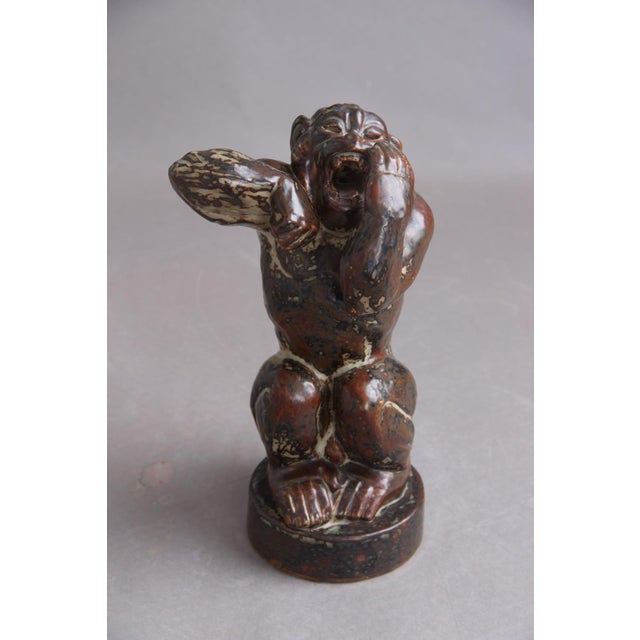 Knud Kyhn (1880–1969) designed this large monkey/gorilla figurine for Royal Copenhagen. Made of beautiful stoneware, model...