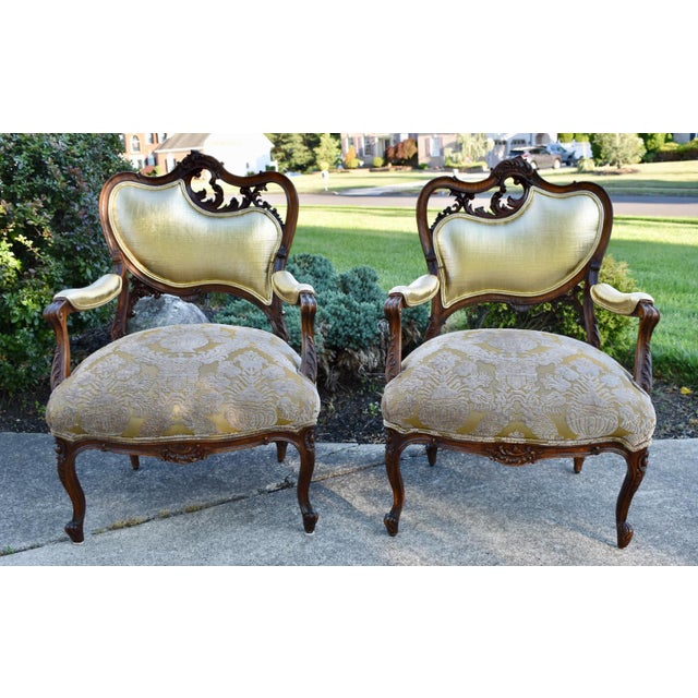 Vintage - (1990's) Ornate Pair of Arm / Accent Chairs have a French Louis XV Style. The Frames are Wood. Carved Walnut....