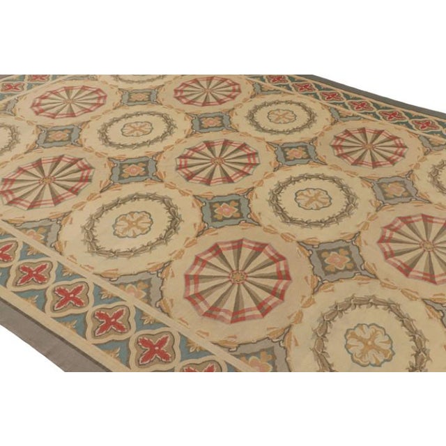 This 9x12 vintage Aubusson rug represents an elegant mid-century reimagining of the Neoclassical style—an exceptional new...