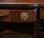 Refined Adams style sideboard with a brass back rail mahogany Circa 1880 Features classic Adams motifs like the wide urn...
