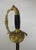 Sword of a senior officer or high-ranking official, Empire period. Gilt bronze hilt, molded branch with a lion's head in...