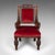 This is an antique morning room elbow chair. A Scottish, carved oak throne seat in Gothic revival taste, dating to the...
