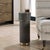 Pedestal Style Drink Table Covered In An Elegant Charcoal Faux Shagreen And Brushed Brass Finished Stainless Steel...