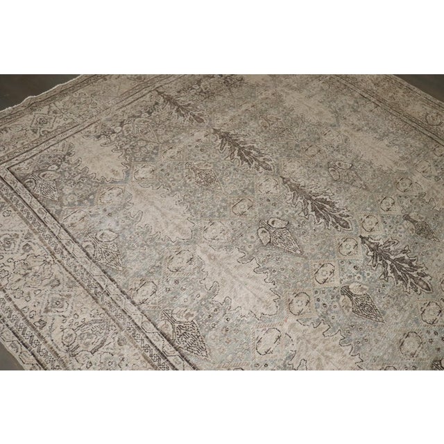 Design: An all-over botanical pattern with stylized palmettes, leaves, and small floral motifs rather than a central...