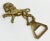 Vintage regal poised lion brass bottle opener. Wonderful conversation piece. Strong patina.