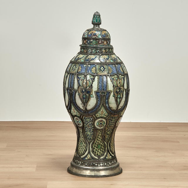 Standout vintage Moroccan lidded urn crafted in terra cotta in classic form. Decorated in distinctive Mediterranean colors...