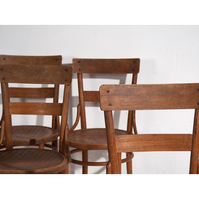 Antique set of four Thonet chairs (c.1920) Dimensions: Width: 45 cm Depth: 44 cm Height: 90 cm Seat: 48 cm Style: Mid 20th...