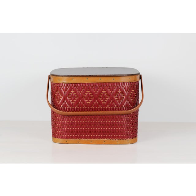 Add retro charm, graphic texture, and easy cottage-style storage to your home with this large vintage red woven picnic...