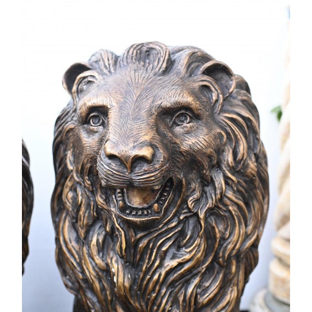You are viewing an impressive pair of large English bronze lion gatekeeper statues. I hope the photos do this stunning...