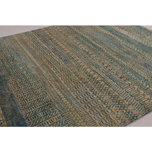 This magnificent 3x10 Minimalist Runner rug from Rug & Kilim’s Modern Collection is a textural work of art, hand-knotted...