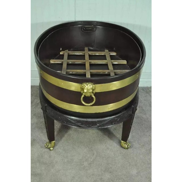 19th Century George III Style Mahogany and Brass Wine Cooler Cellarette on Stand. Item features a brass bound mahogany tub...
