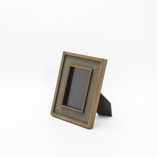 This exquisite 5x7” picture frame by R&Y Augousti is an embodiment of timeless elegance and refined craftsmanship. The...