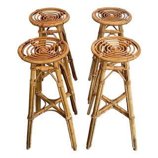 Set of 4 rattan stools. French. Circa 1970 For Sale