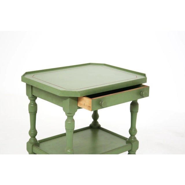 Gorgeous vintage Italian made sofa table from the 1950's. The sofa table was made of green lacquered wood, has a shelf at...