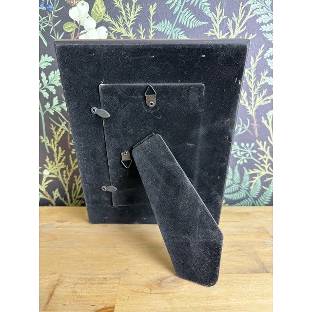 This original miniature watercolor features a graceful heron rendered with soft washes and careful detail. The restrained...